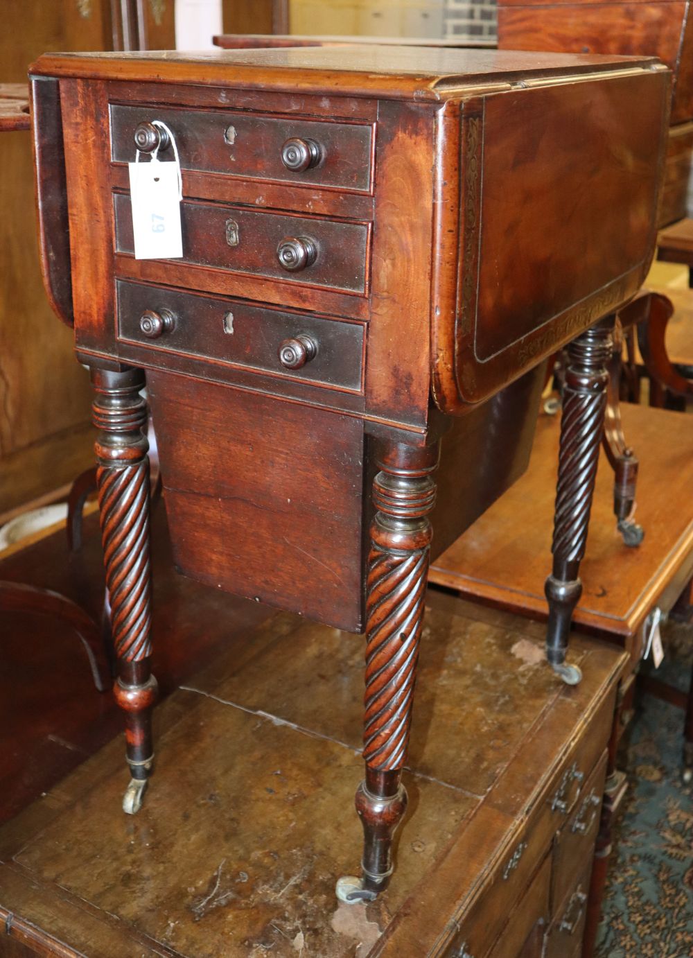 A Regency brass inlaid drop leaf work table, W.54cm, D.36cm, H.76cm